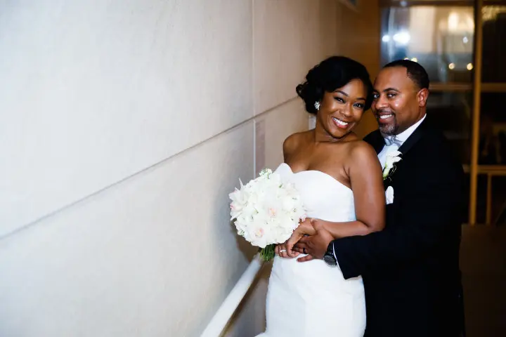 Sideswept wedding hairstyle with curly layers