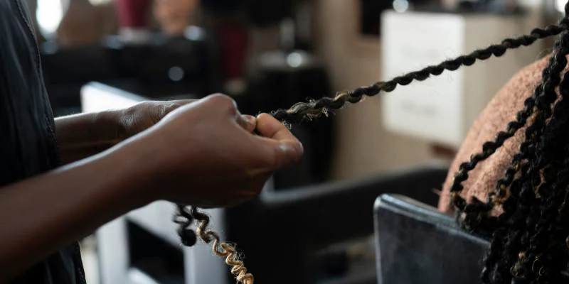 braiding hair at the salon